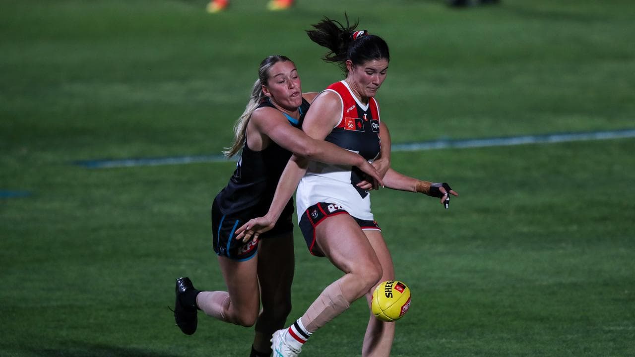 Matilda Scholz tackles St Kilda's Emmelie Fielder.