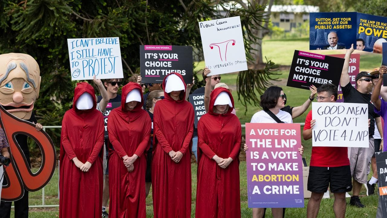 Protesters outside the LNP election campaign launch in Ipswich