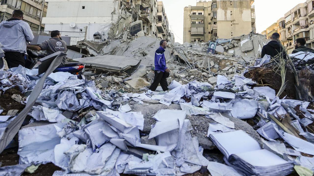 Documents of al-Qard al-Hassan scattered at site of Israeli strike