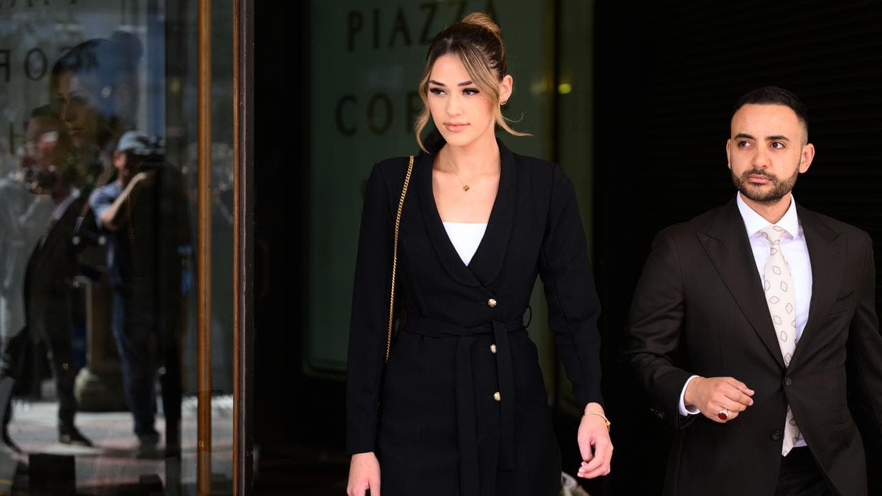 Sarah Mouhanna and her lawyer leave court