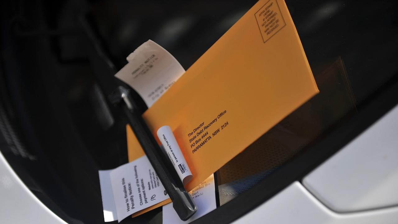 A parking ticket under a windscreen wiper (file image)