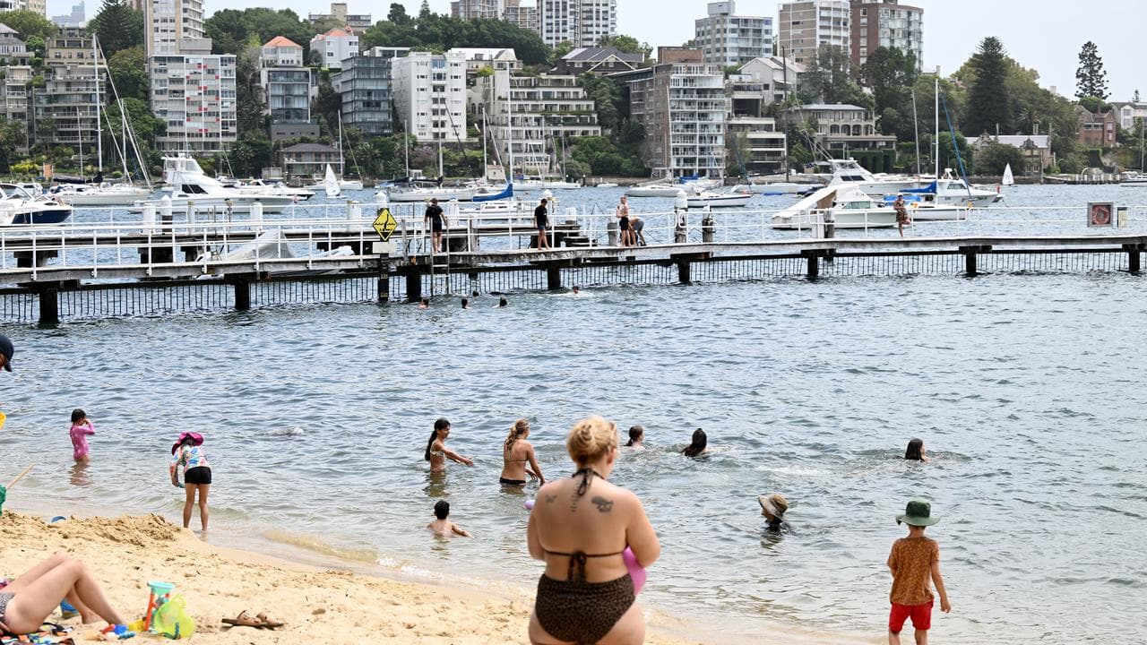 People swimming at Murray Rose pool on Sydney Harbour, at Double Bay