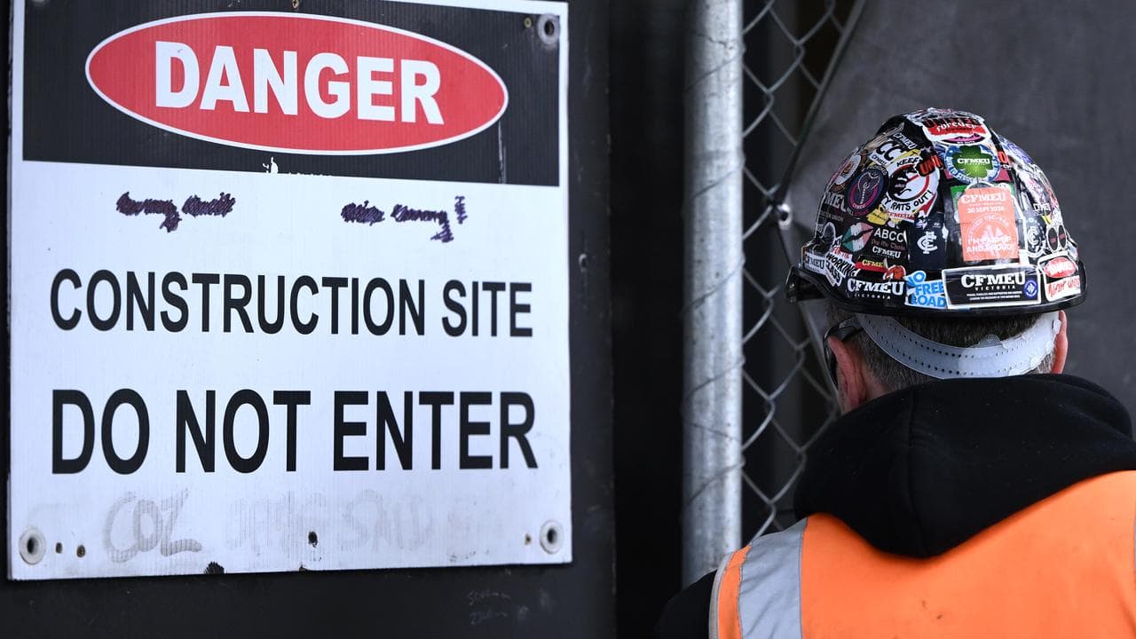 CFMEU signage on a workers helmet at a site