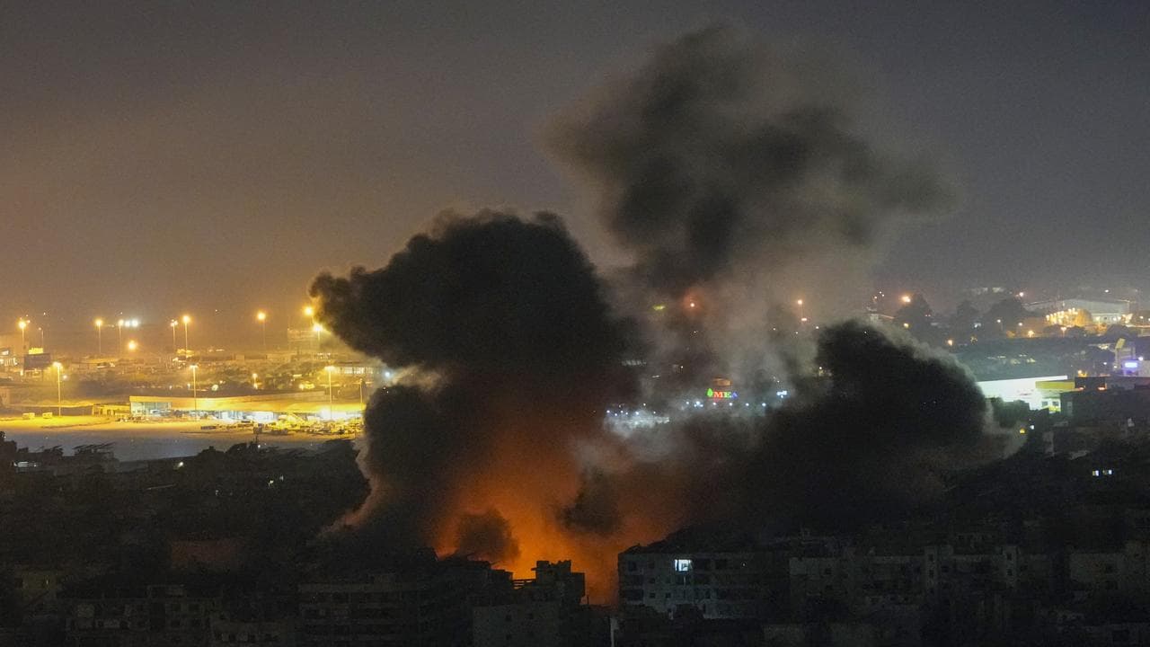 Smoke rises from an Israeli airstrike in Dahiyeh, Beirut.