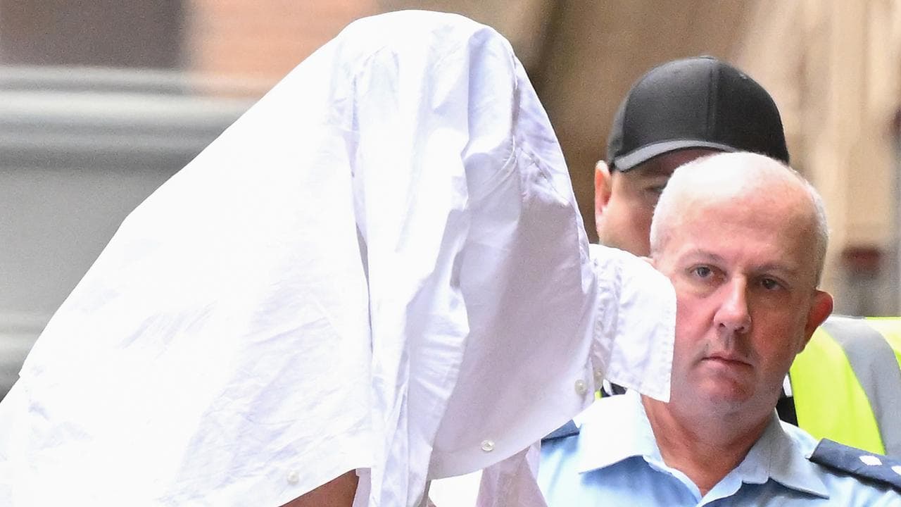 Xiaozheng Lin (left) arrives at the Supreme Court of Victoria i