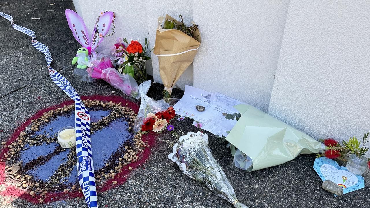 Floral tributes after a house fire