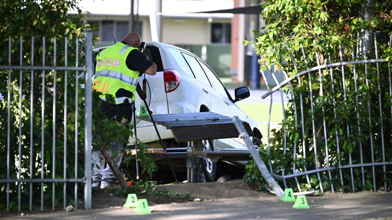Police photographing the car