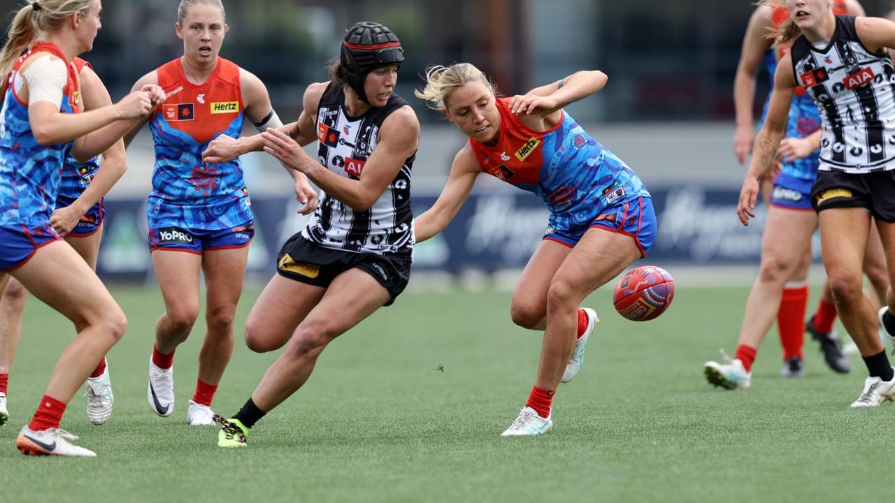 Brittany Bonnici (centre) and Eliza McNamara.