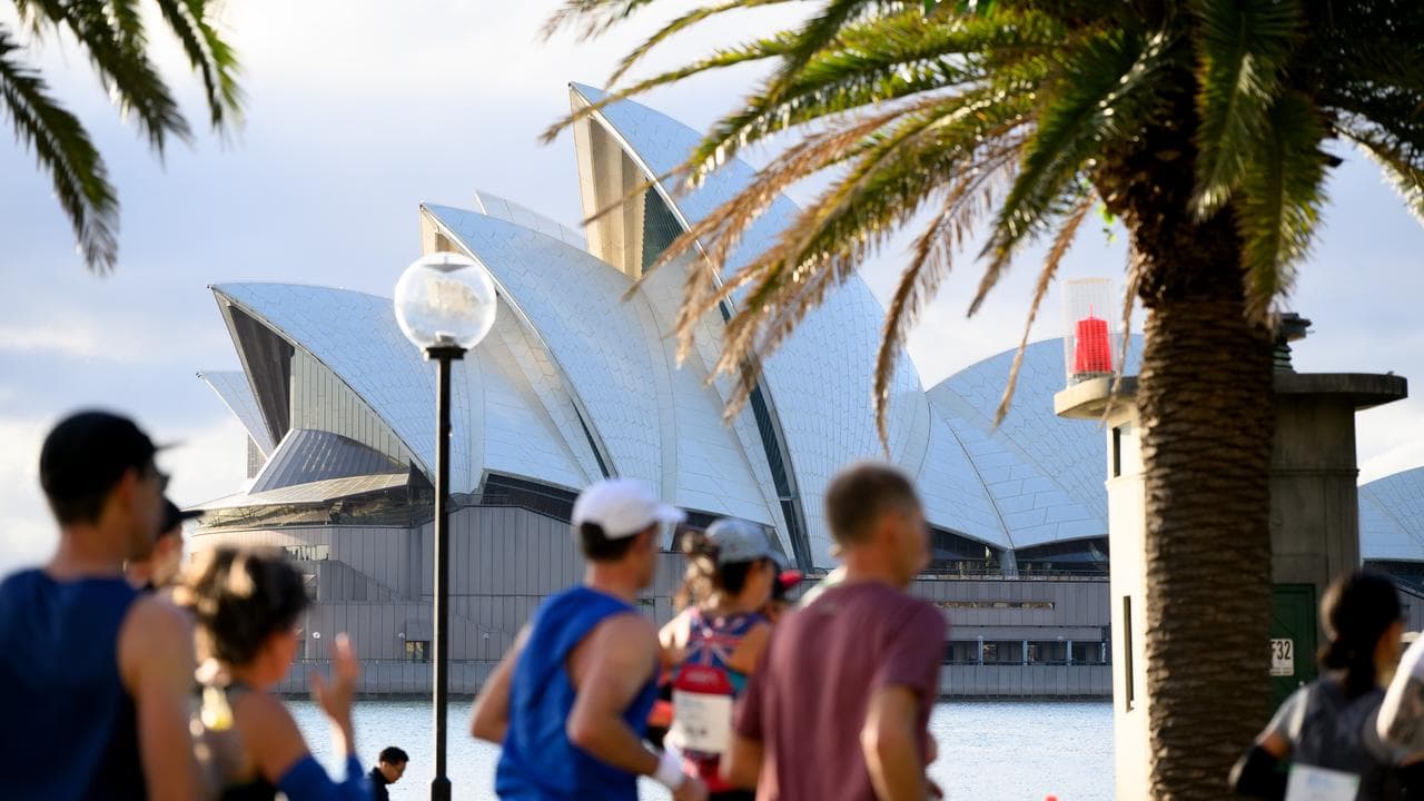 Participants run through The Rocks during the 2024 Sydney Marathon