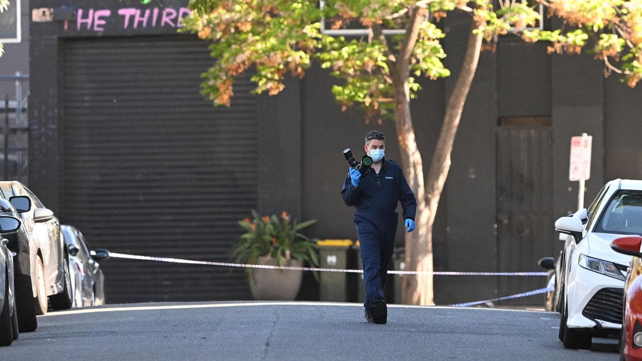 A police forensics officer at the scene