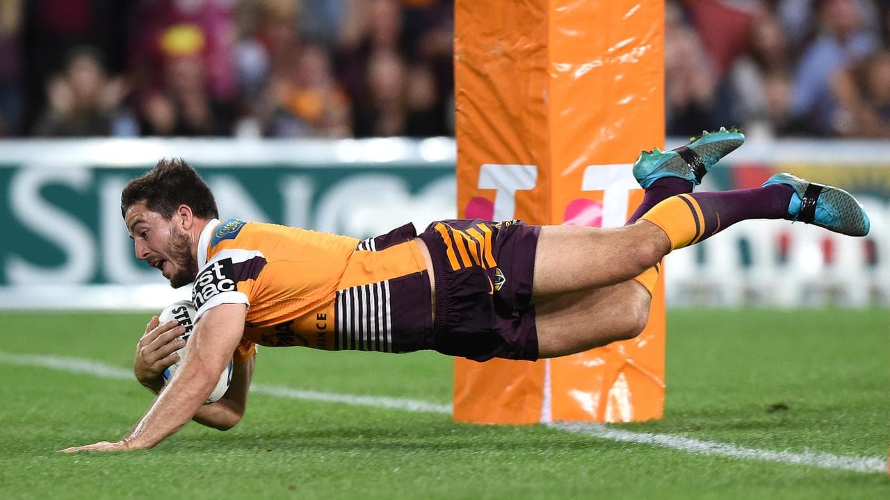 Ben Hunt playing for  Brisbane.