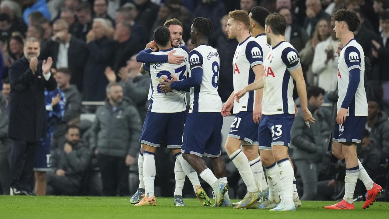 Manager Ange Postecoglou (left).