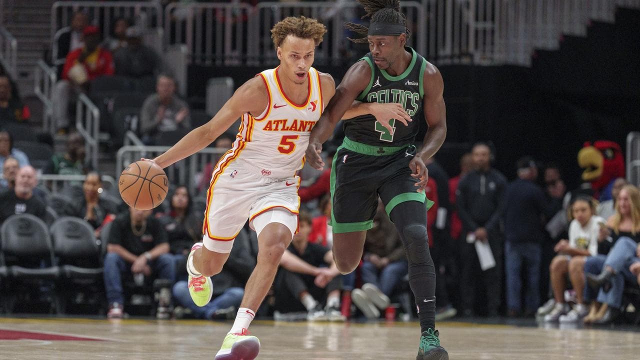 Dyson Daniels (5)  and Jrue Holiday