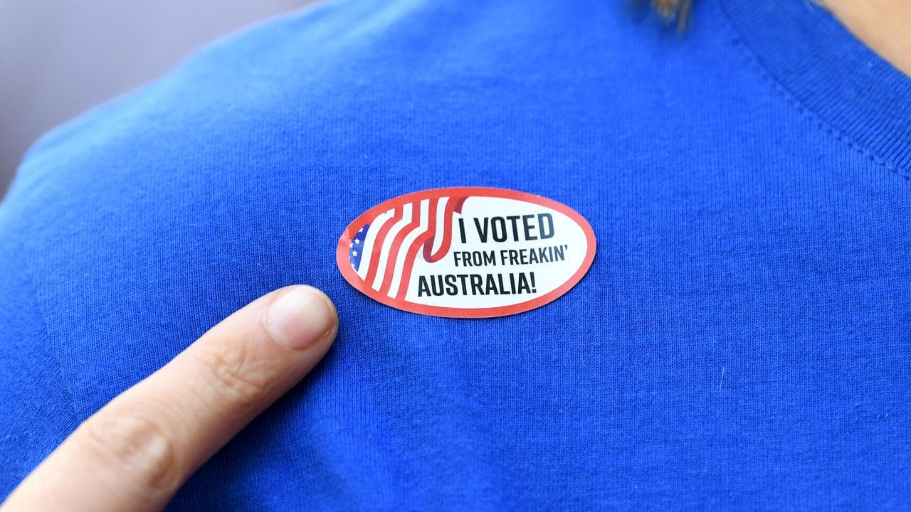 Person wears sticking saying I Voted From Freakin' Australia!