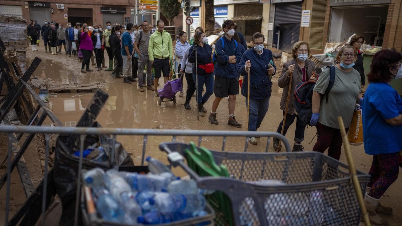 Residents line up for water