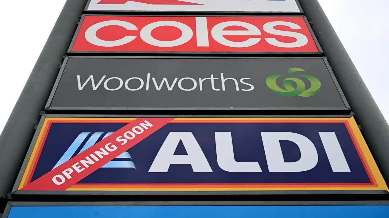 Signs for Target, Kmart, Coles, Woolworths and Aldi