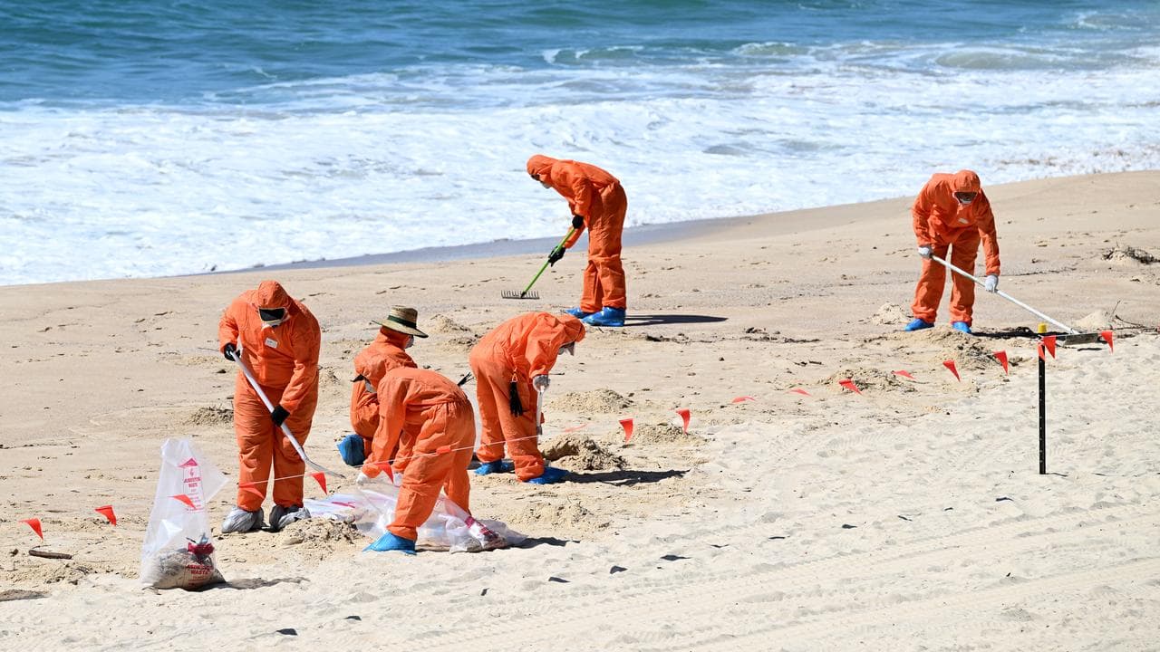 A file photo of workers cleaning up at Coogee