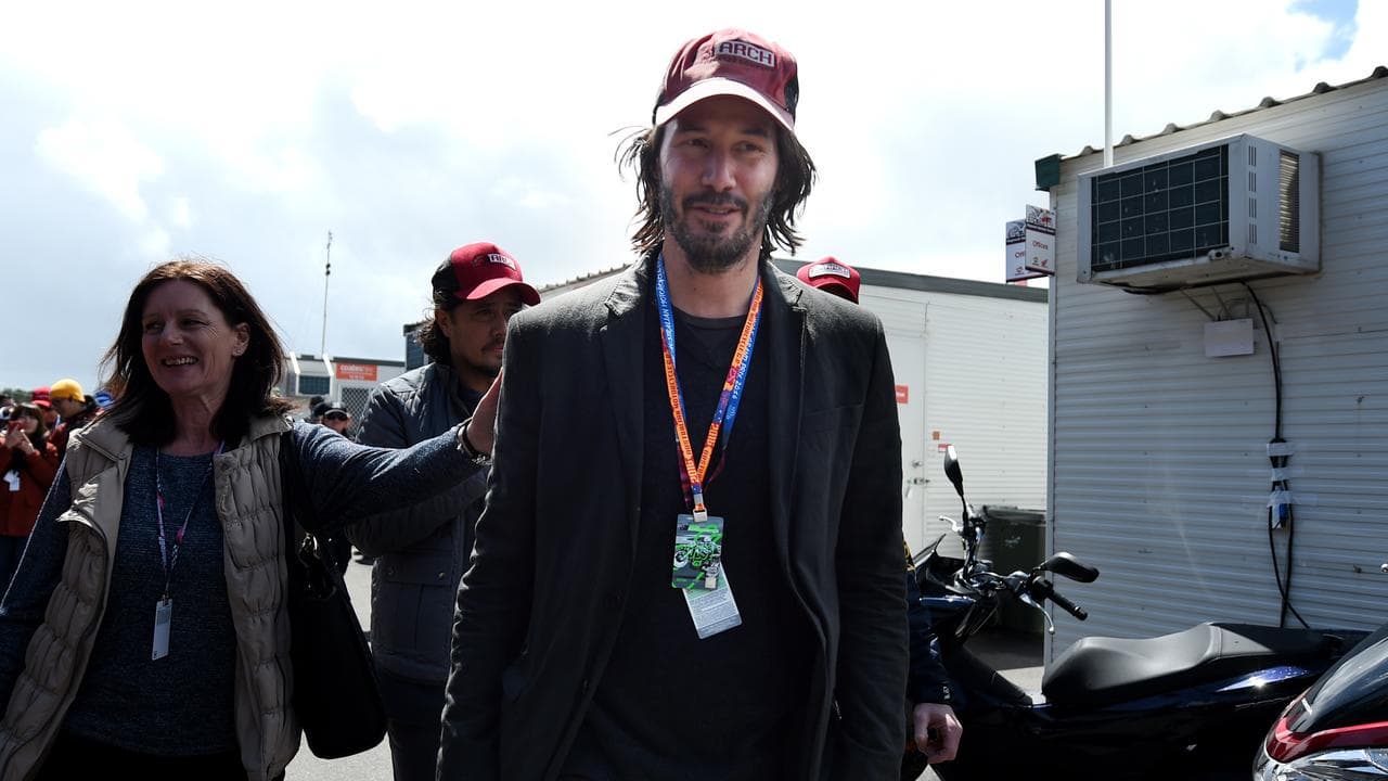 Keanu Reeves leaves the pits at the 2016 Australian MotoGP
