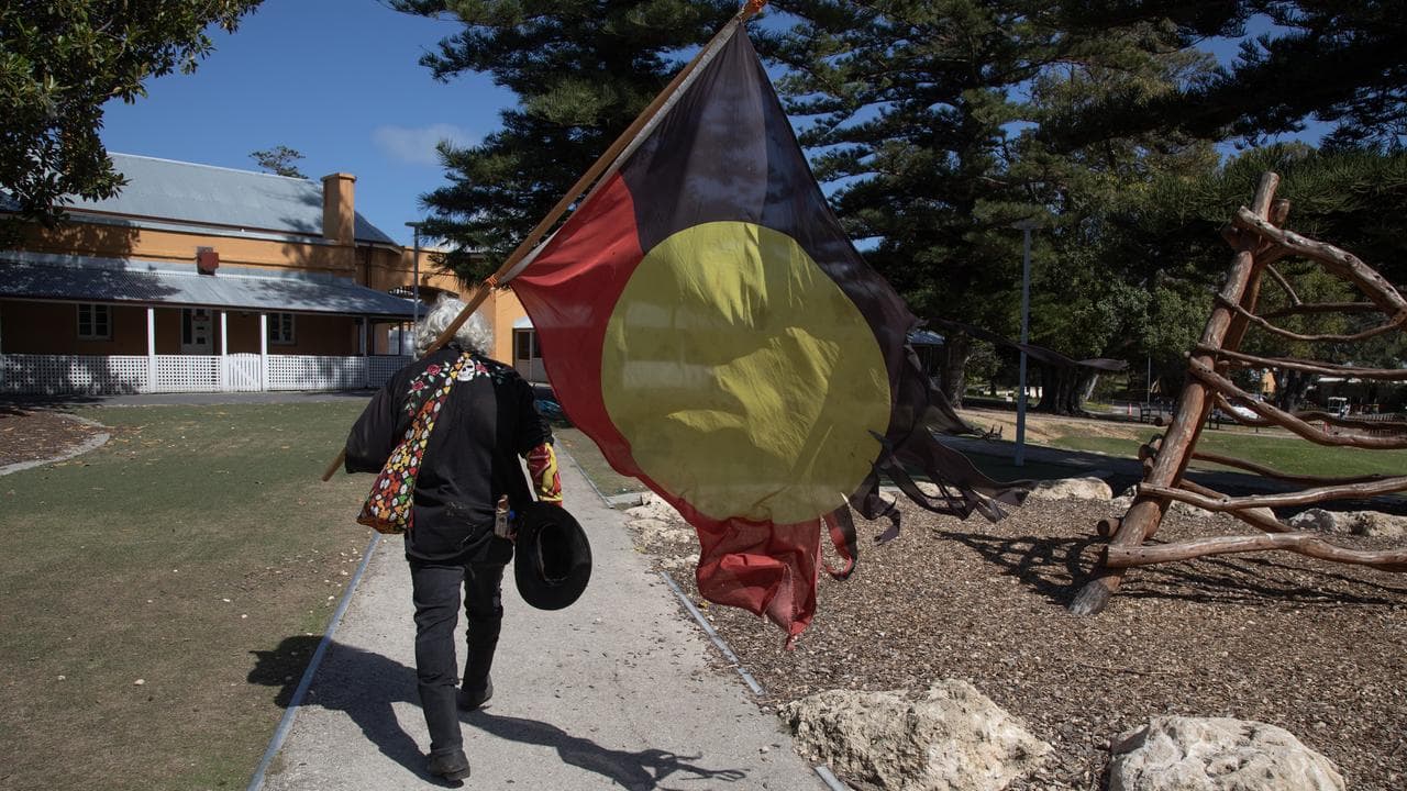Herbert Bropho walks towards the Quod
