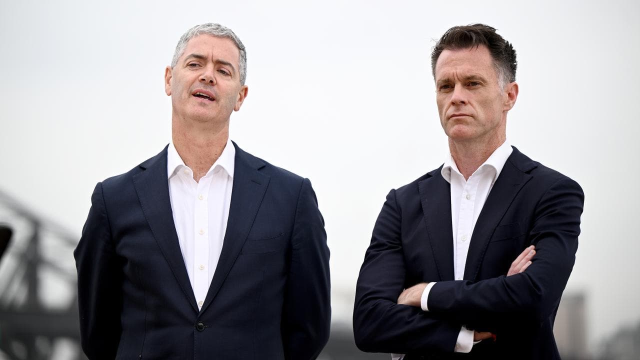 Roads Minister John Graham (left) and Premier Chris Minns