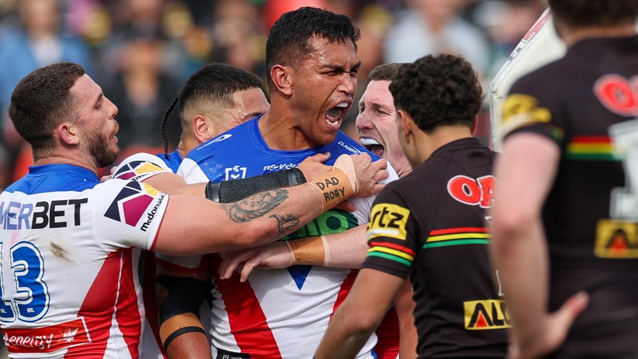 Former Newcastle prop Daniel Saifiti (centre).