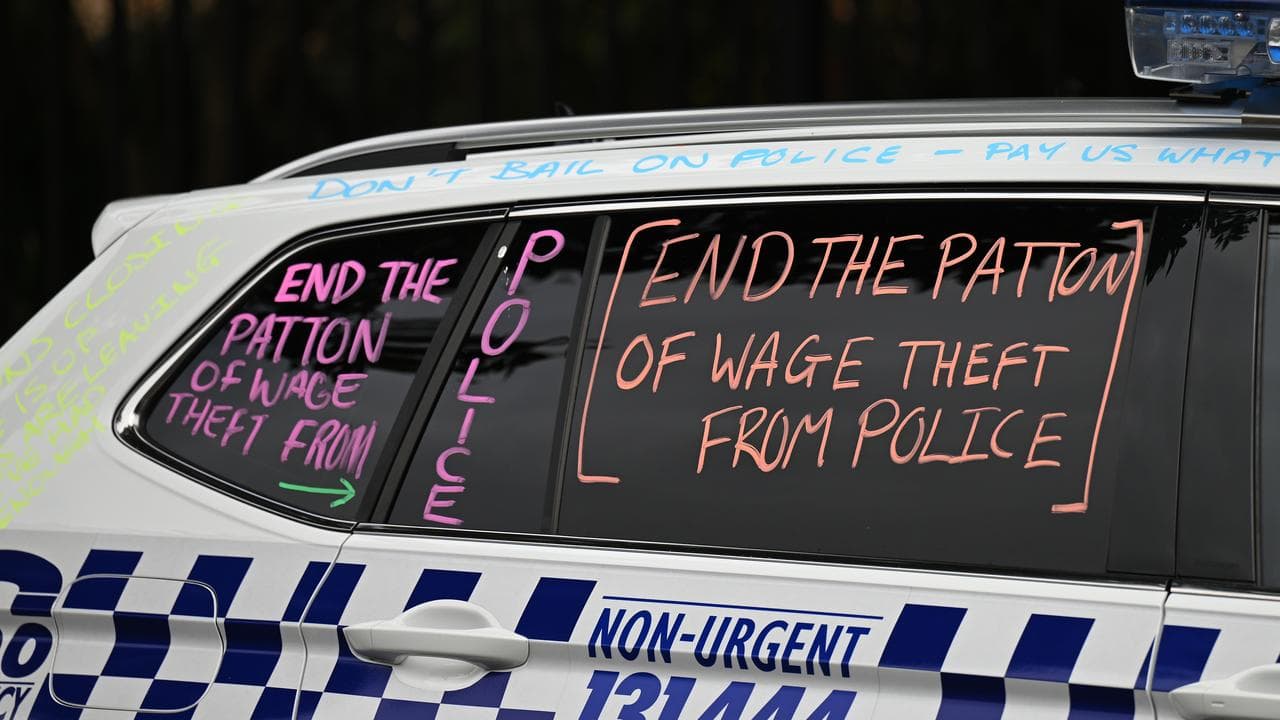 Messages written on a police car.