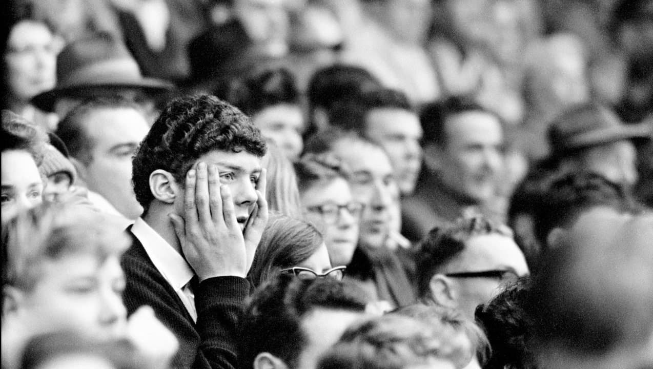 Man in crowd at VFL game