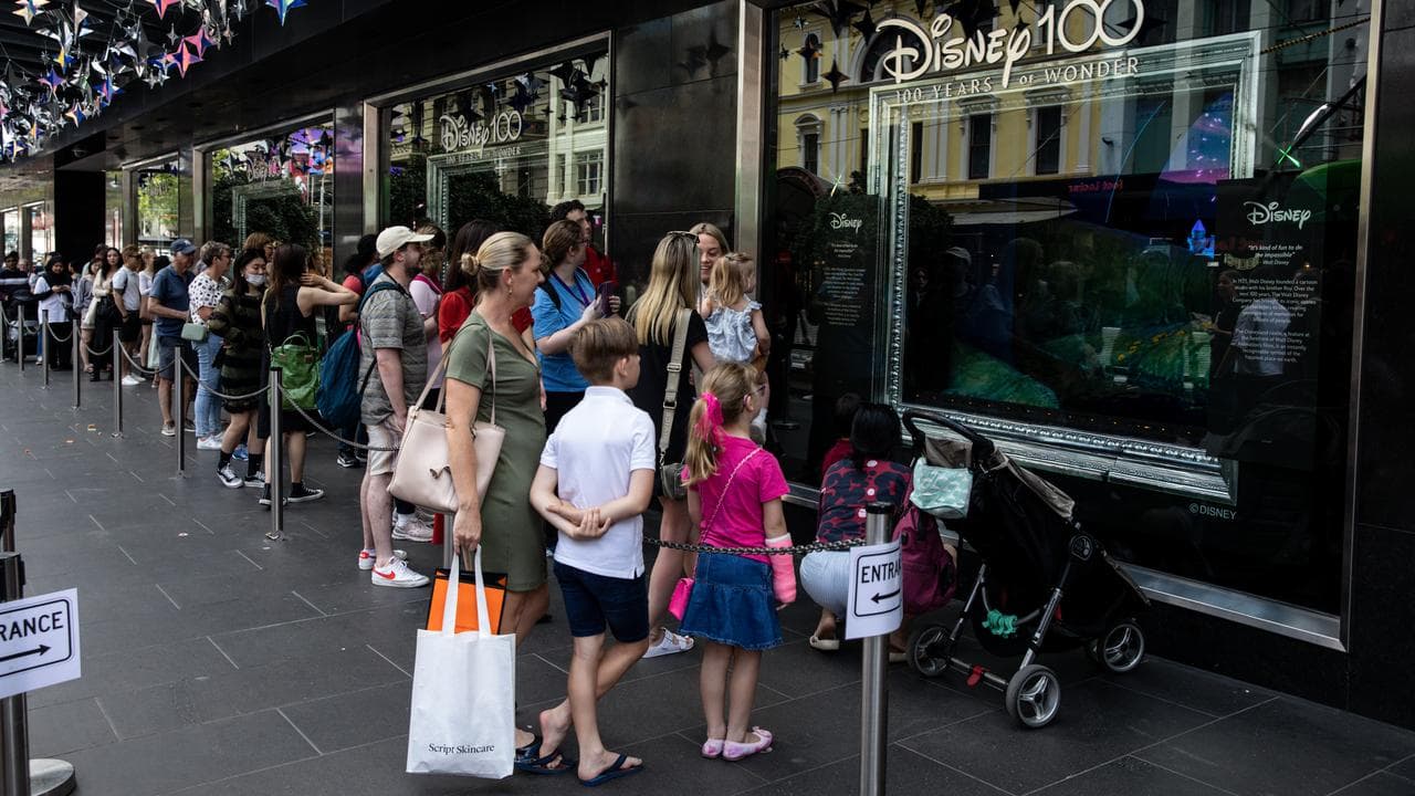 People view the Myer’s Christmas windows in Melbourne in 2022.