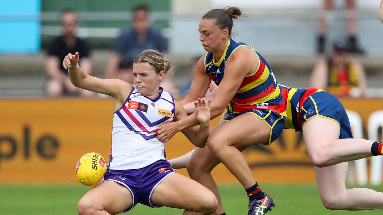 Fremantle's Dana East (left) and Adelaide's Ebony Marinoff.