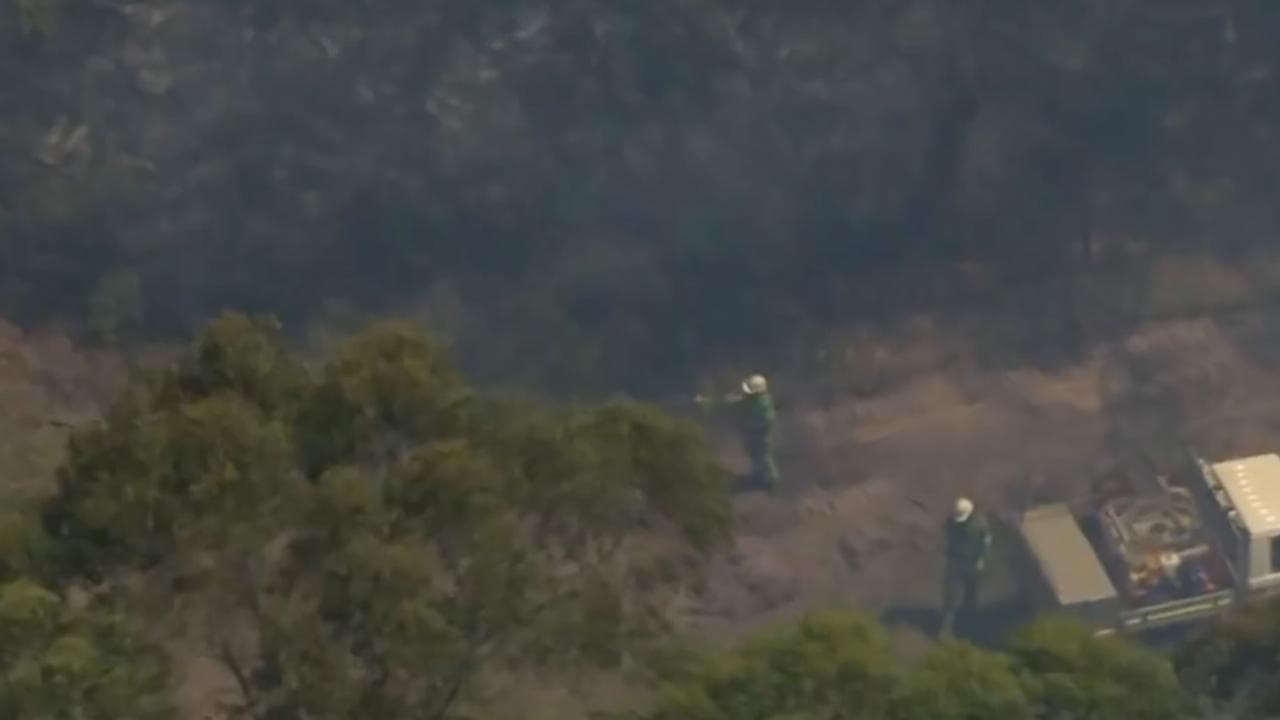 Firefighters fighting bushfires in western Victoria