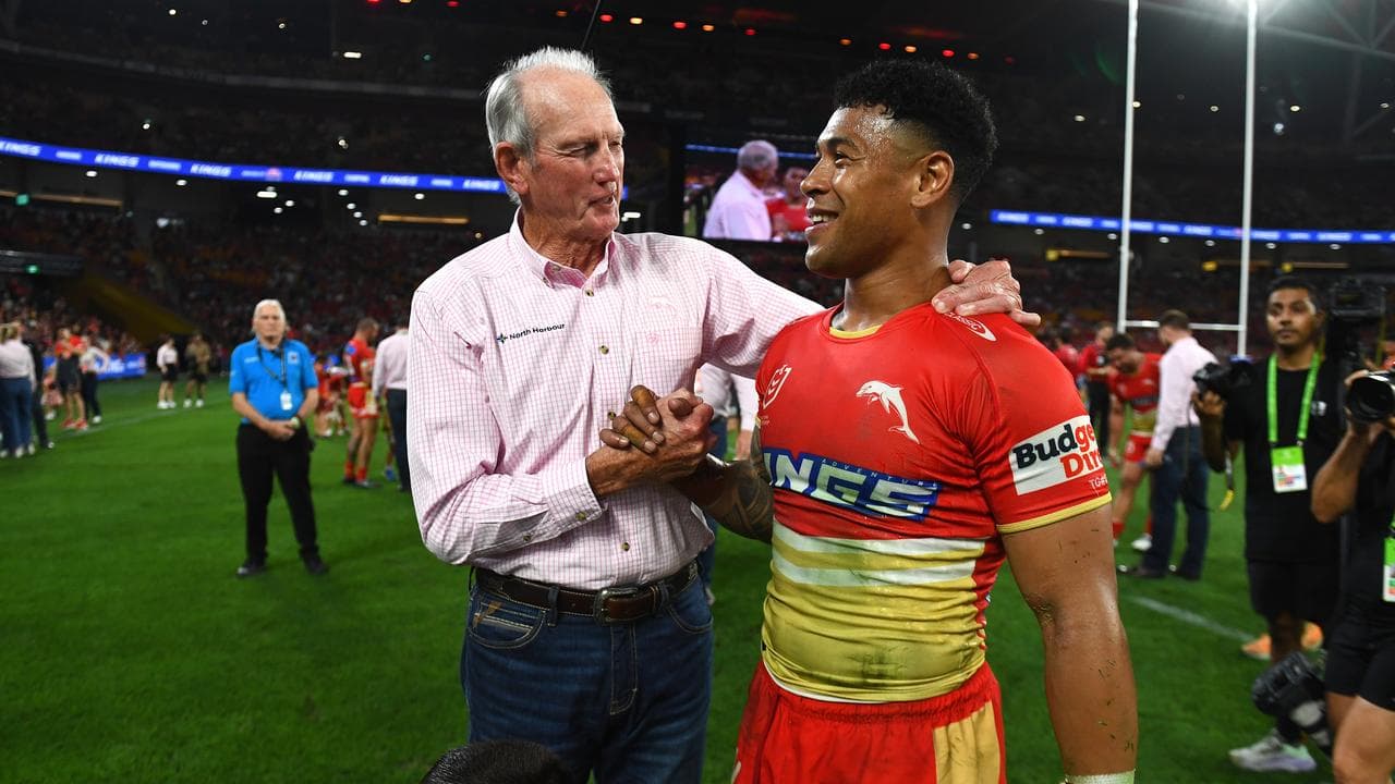 Wayne Bennett embraces Jamayne Isaako.