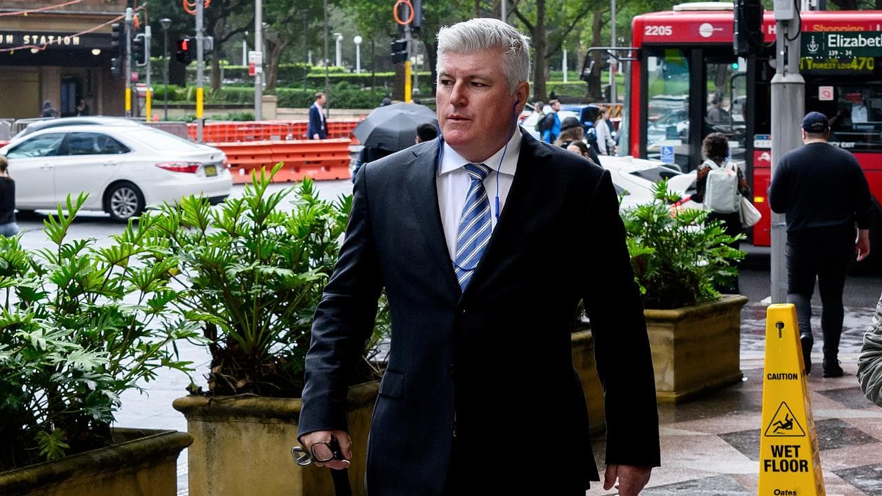 Stuart MacGill outside court