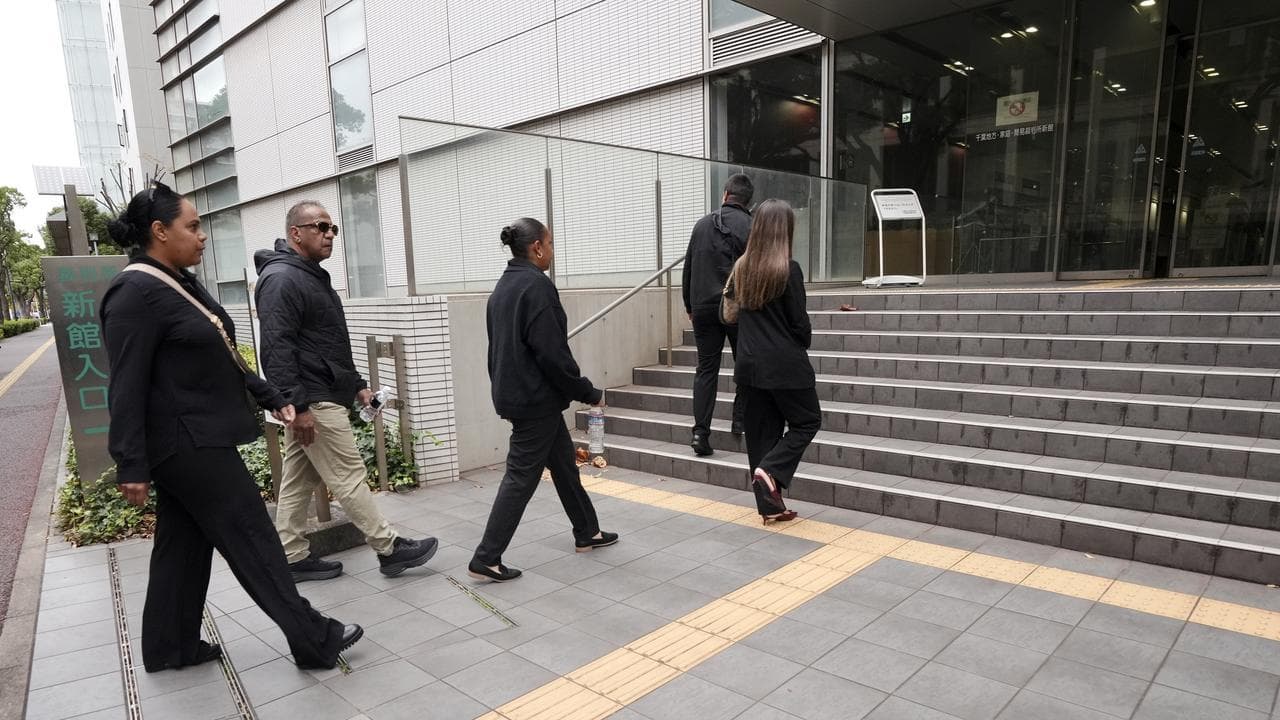 Family of Donna Nelson enter the Chiba District Court