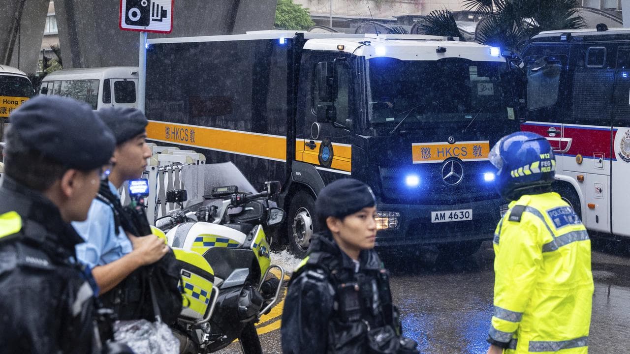 Security outside the West Kowloon Magistrates Courts in Hong Kong
