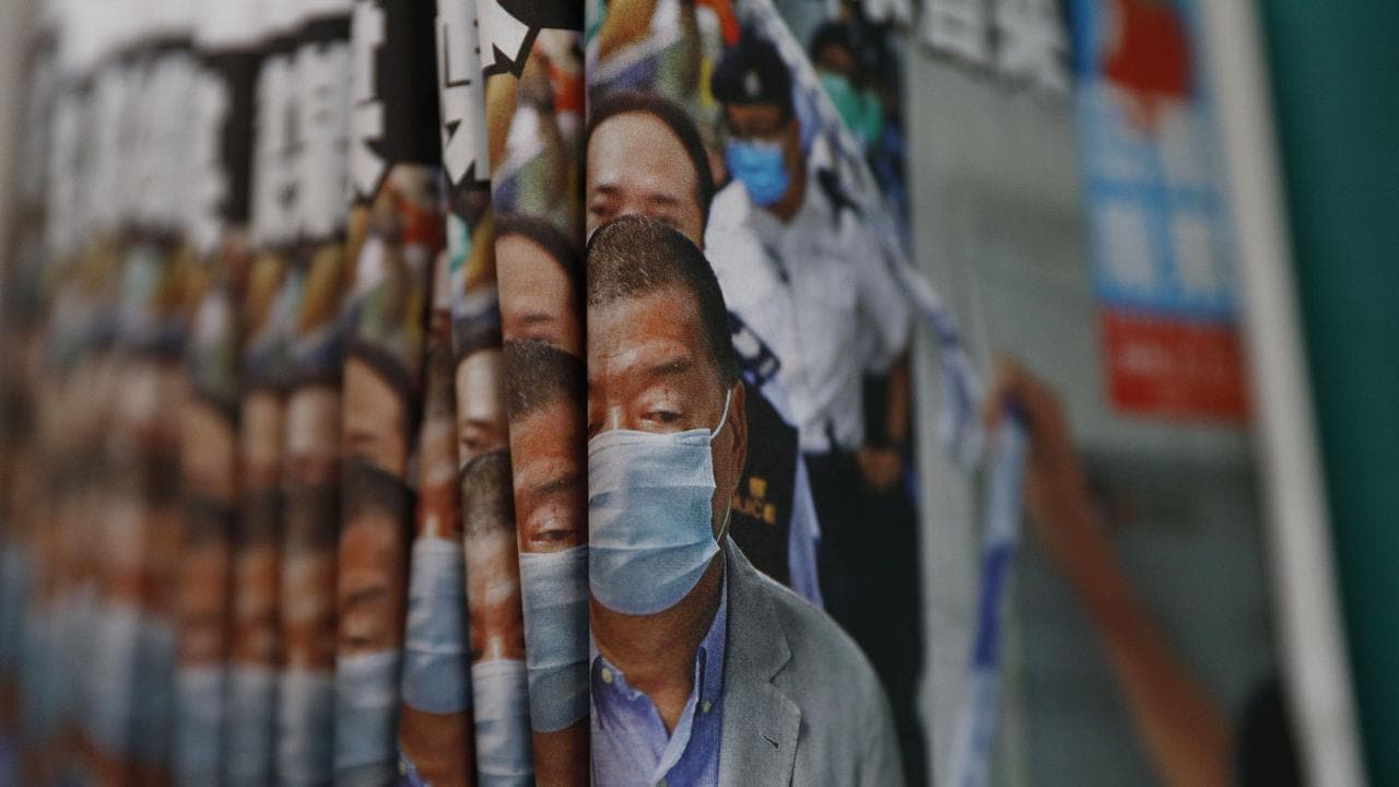 Copies of Apple Daily newspaper featuring Jimmy Lai