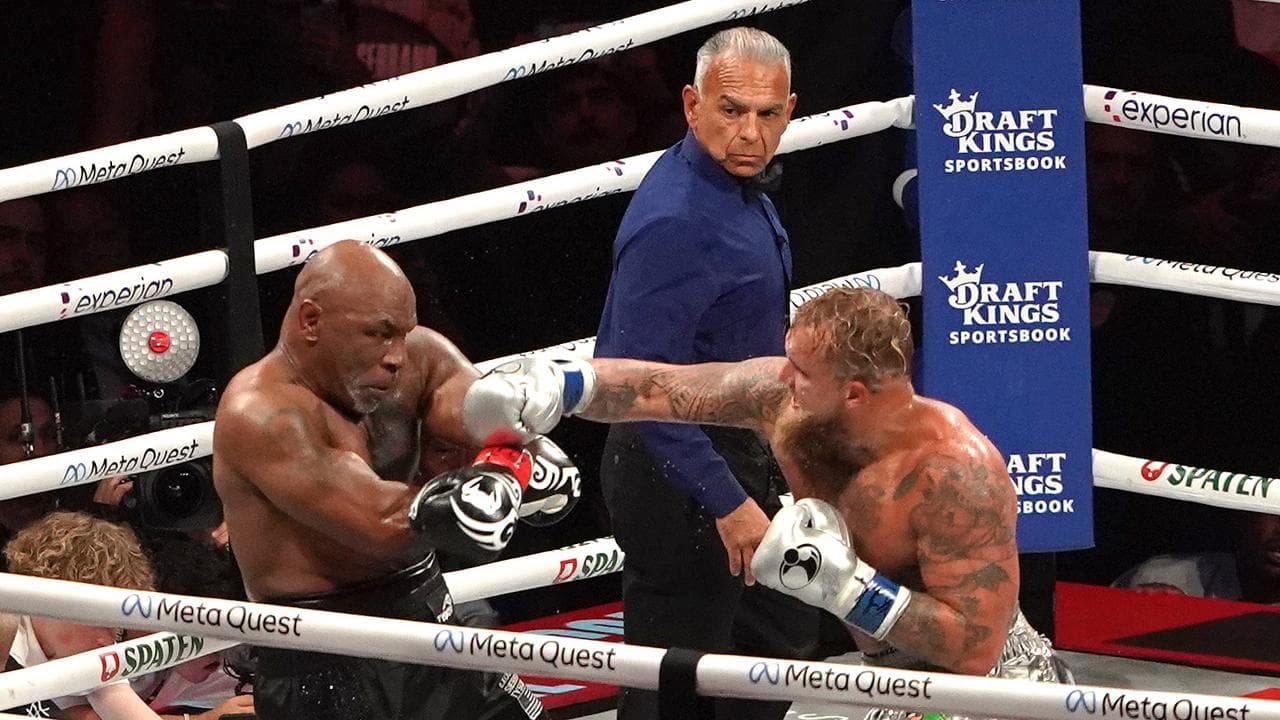 Jake Paul (R) in action against Mike Tyson (L)  in Arlington, Texas