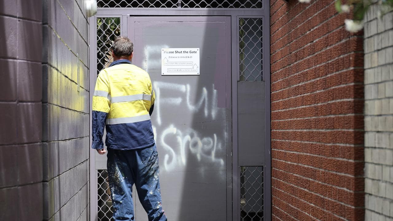 Graffiti is removed from a building