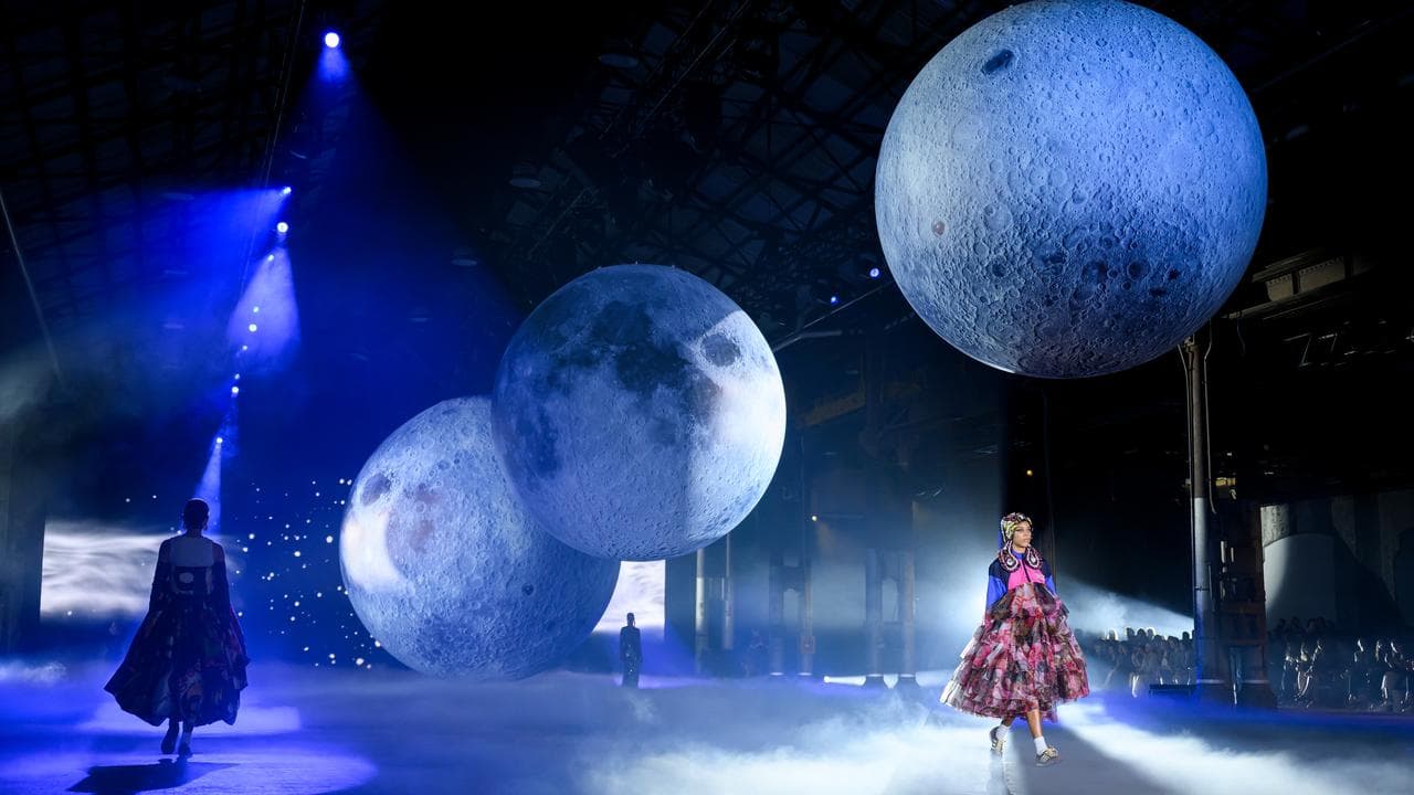 Models walk the runway during the Romance Was Born fashion show