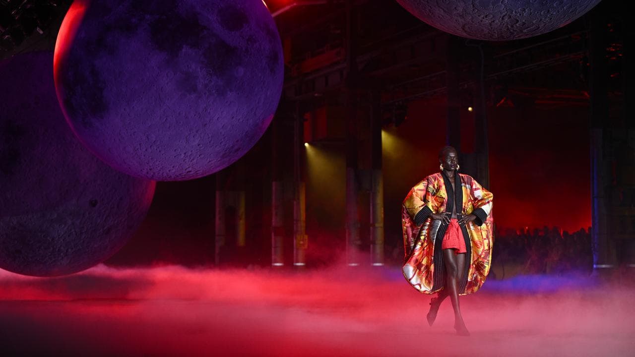 Models walk the runway during the Romance Was Born fashion show