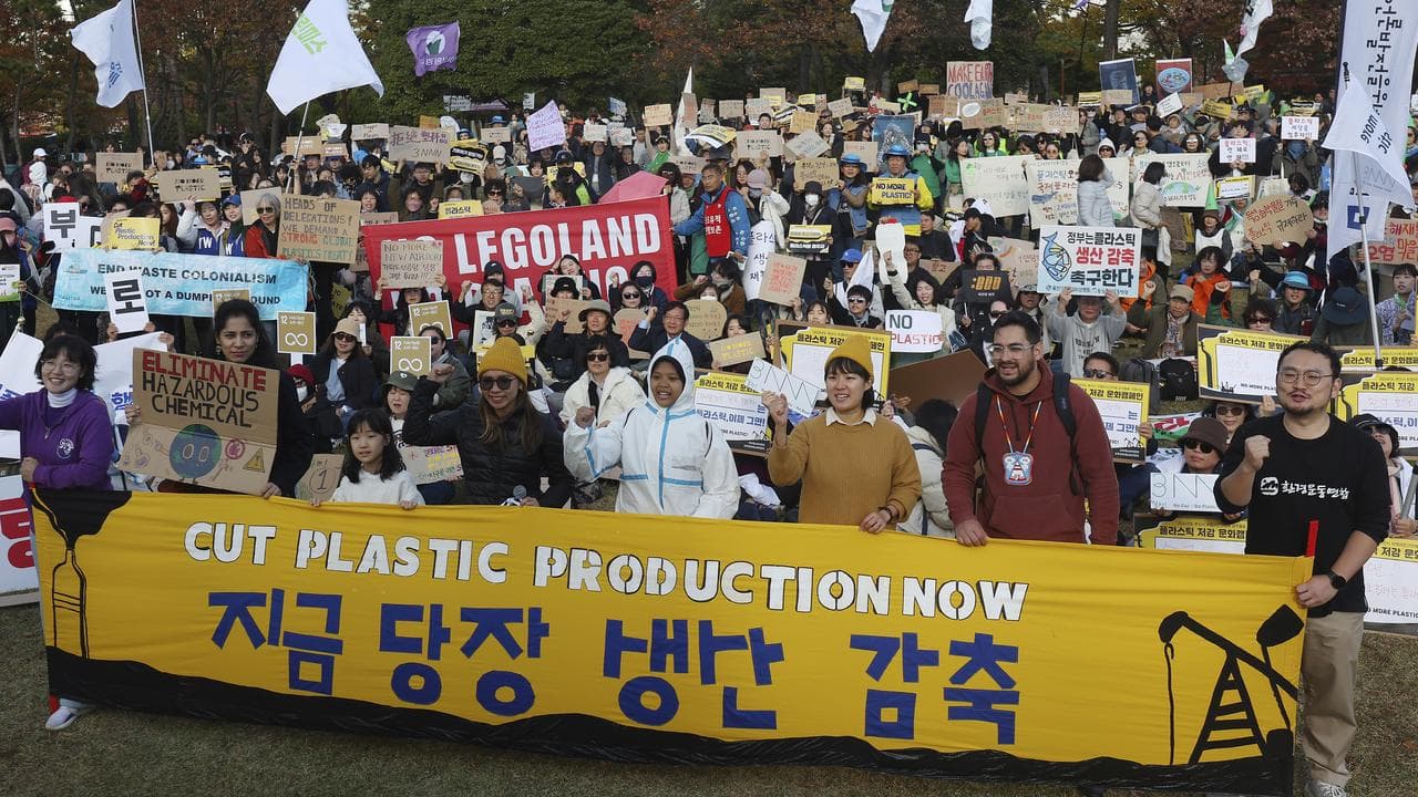 Environment activists rally for a strong global plastics treaty