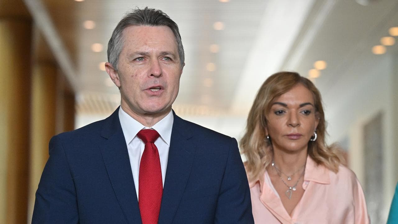 Jason Clare and Anne Aly