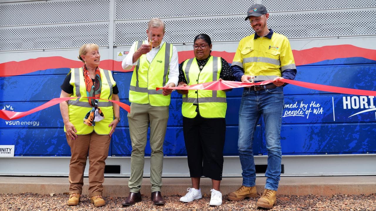 WA Energy Minister Reece Whitby (centre) opened the trial in November.