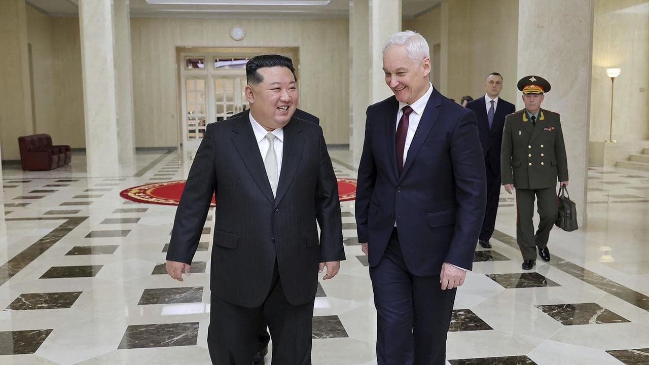 Kim Jong-un and Andrei Belousov