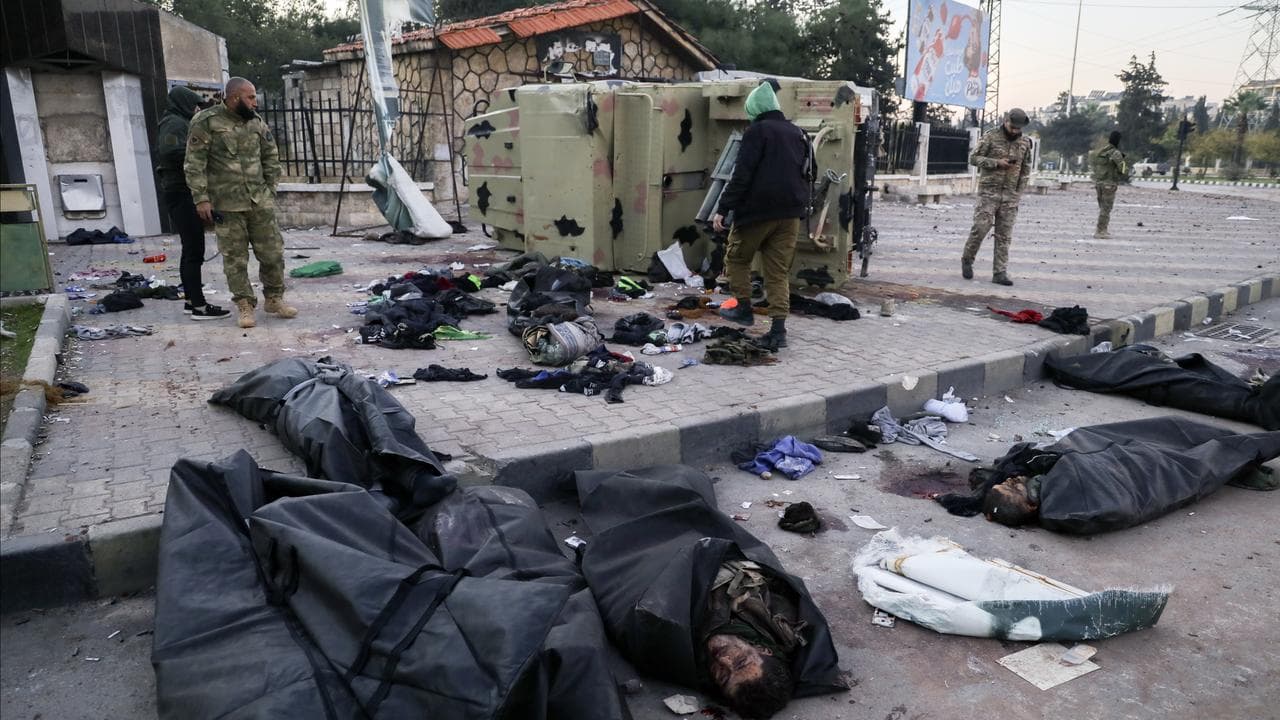 The bodies of Syrian army soldiers and allied fighters