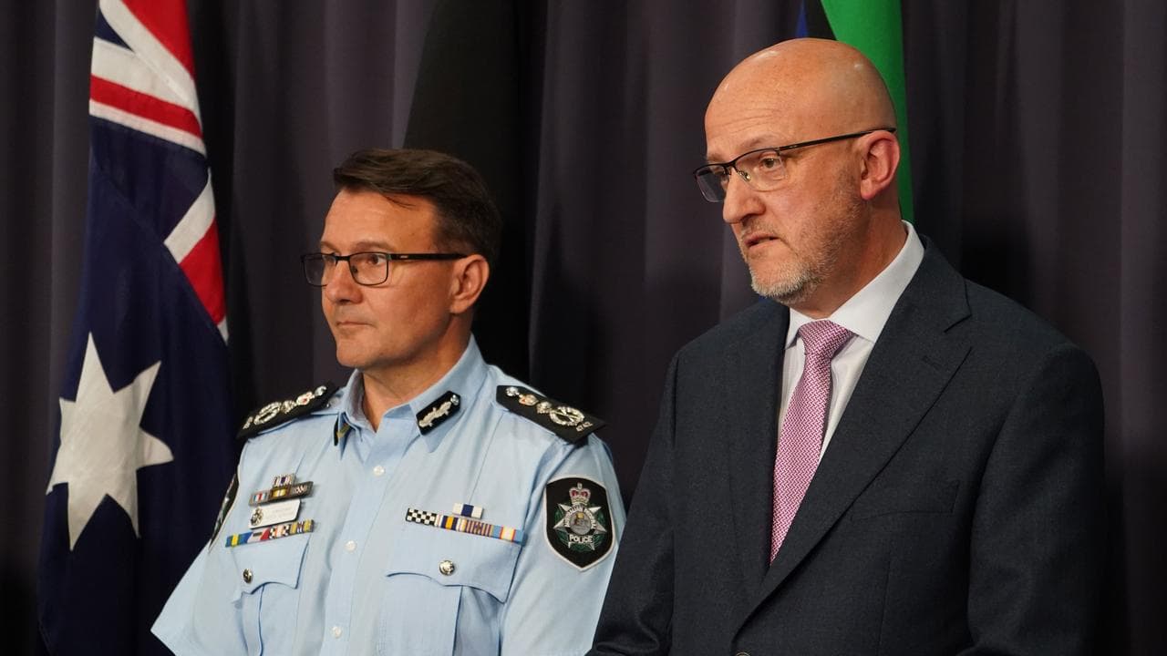 ASIO head Mike Burgess (right) and AFP Commissioner Reece Kershaw.