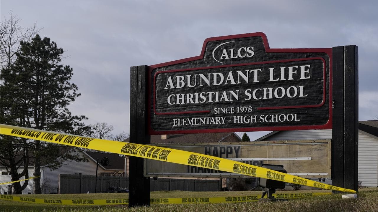 Police tape is seen outside the Abundant Life Christian School