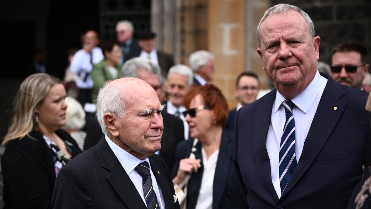 Former PM John Howard (left) and former treasurer Peter Costello