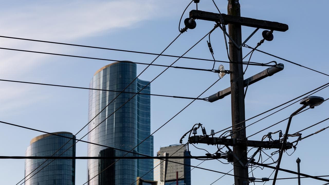 Electricity poles and wires are seen in Melbourne