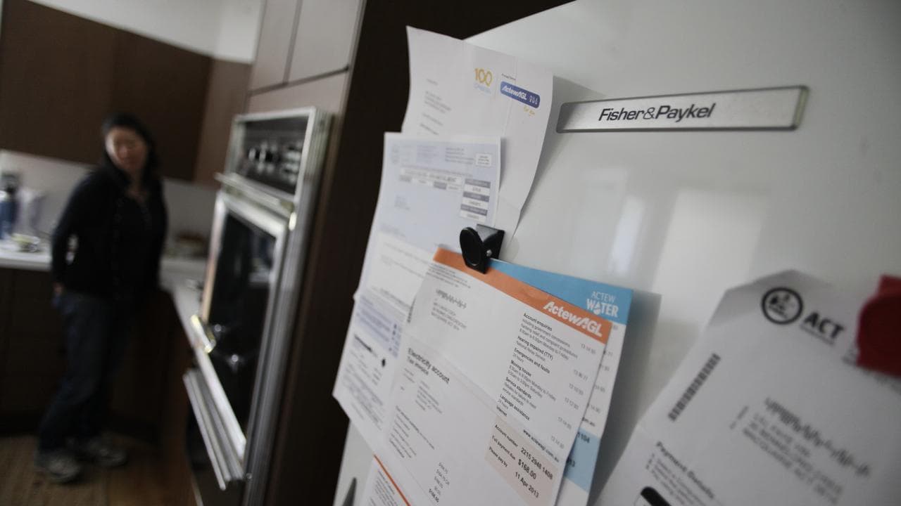 Bills seen hanging on a fridge (file image)