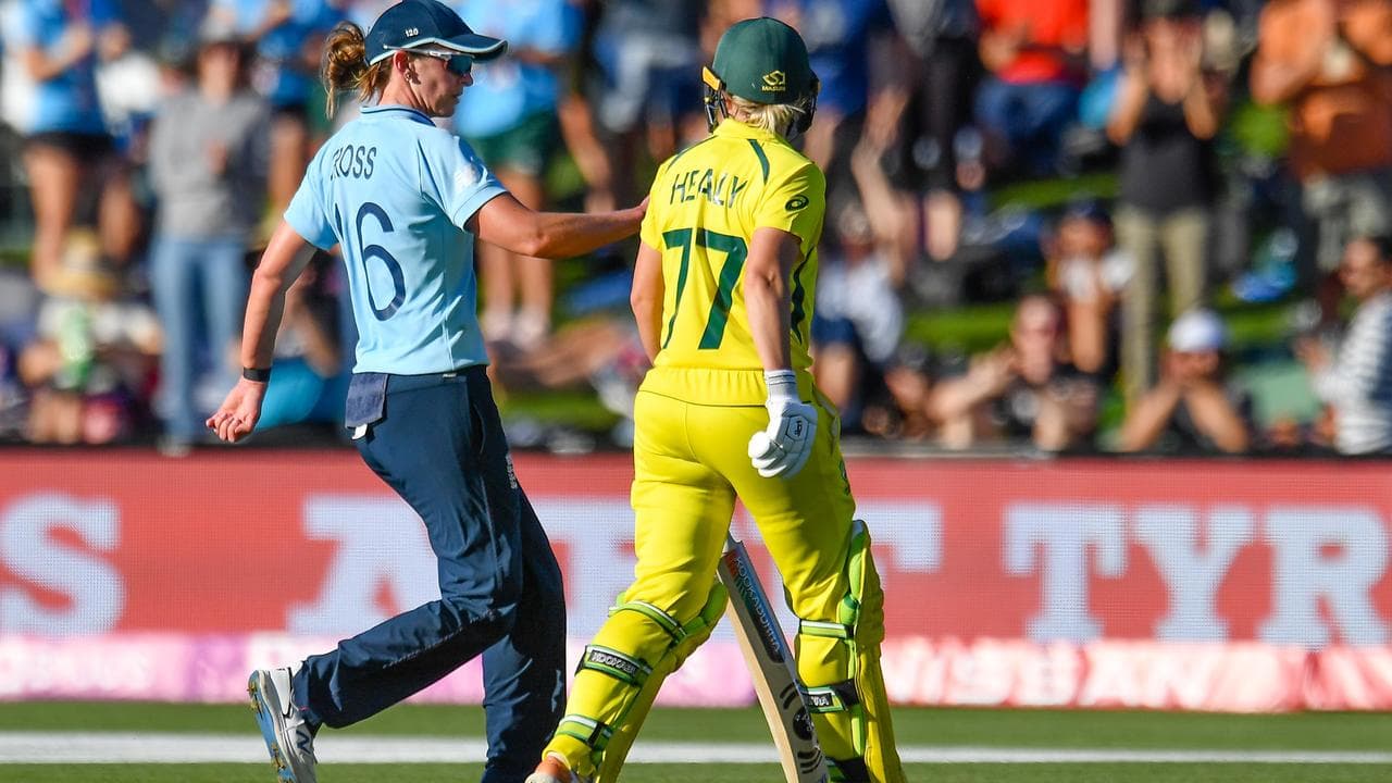 England veteran Kate Cross (left).
